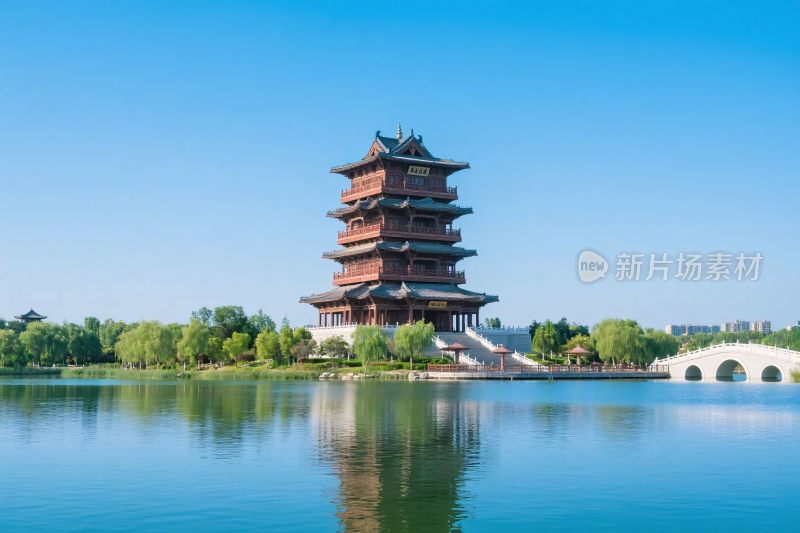 古塔碧水风光图