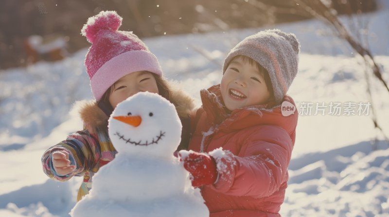 雪地堆雪人冬天下雪小孩儿童嬉戏