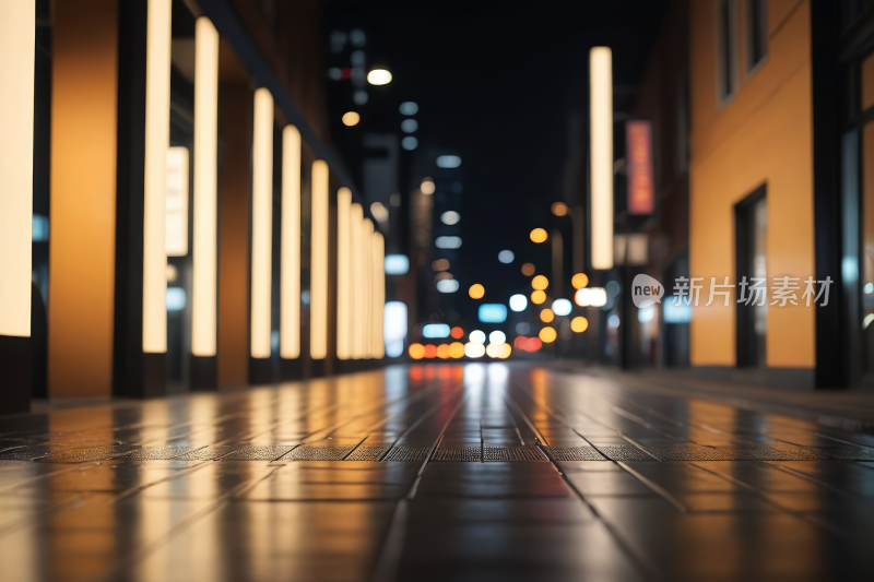 夜晚一条城市街道的模糊图像高清背景图片