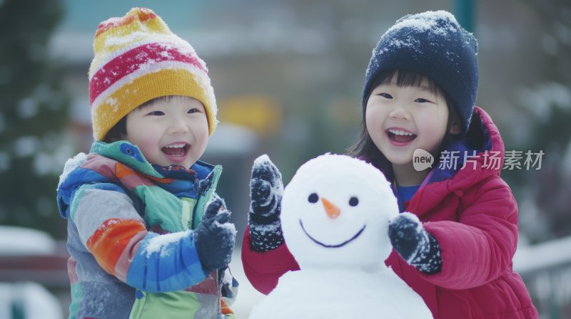 雪地堆雪人冬天下雪小孩儿童嬉戏