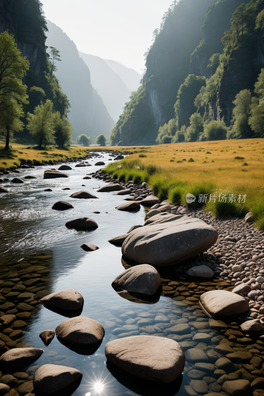 一条河流穿过山谷山谷里有岩石高清风景图片