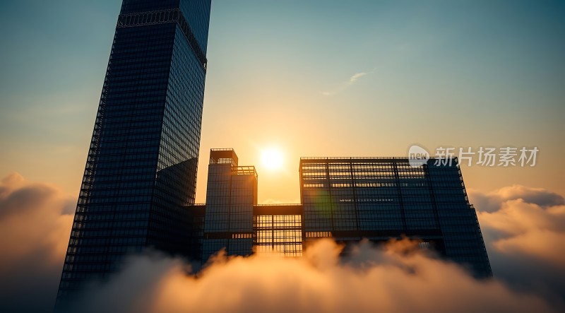 云雾缭绕摩天大楼日出时分