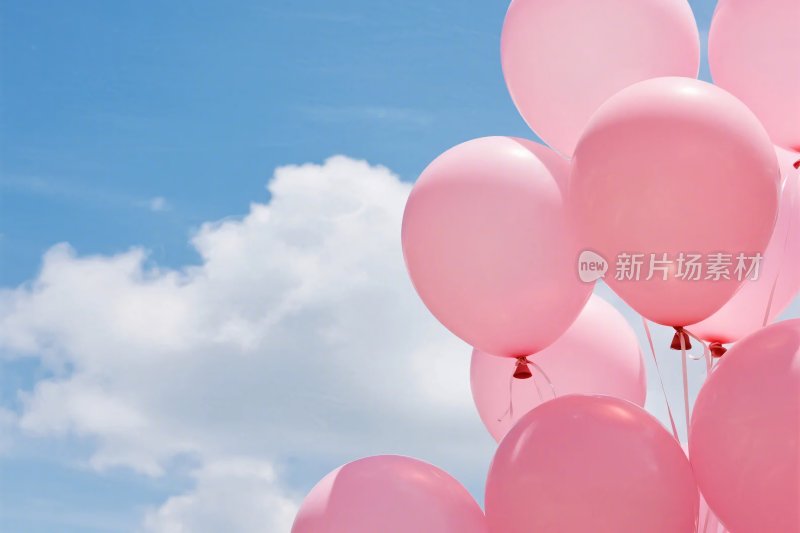 粉色气球与蓝天