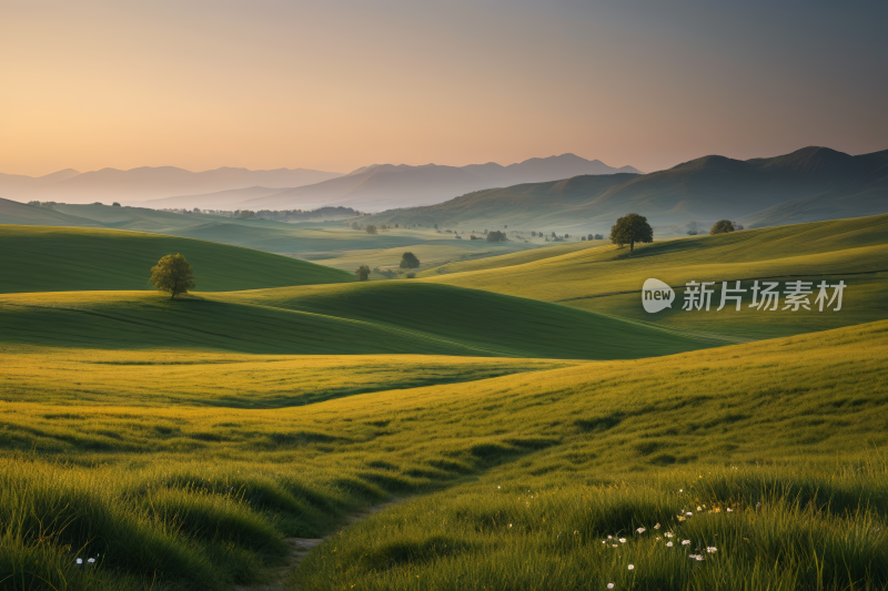 草地山丘日落时一条小路穿过高清风景图片