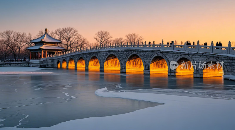 大雪节气景区石桥古建筑雪景风光图