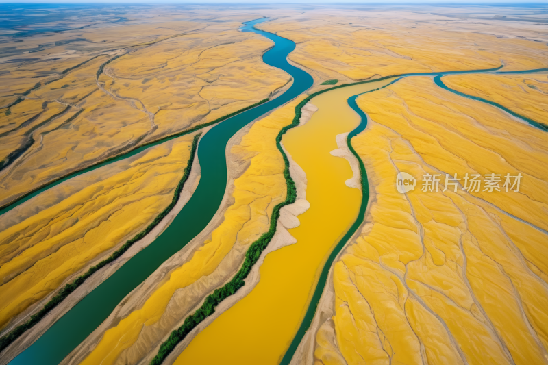 一条河流穿过黄色沙漠的景色风景风光图片