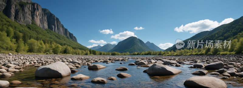 一条河流流经岩石山谷山脉高清风景横幅图片