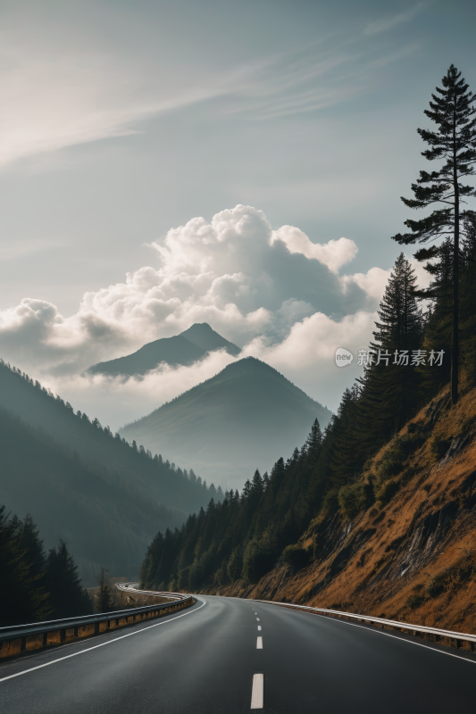 一条长长的路穿过山脉一座高山清风景图片