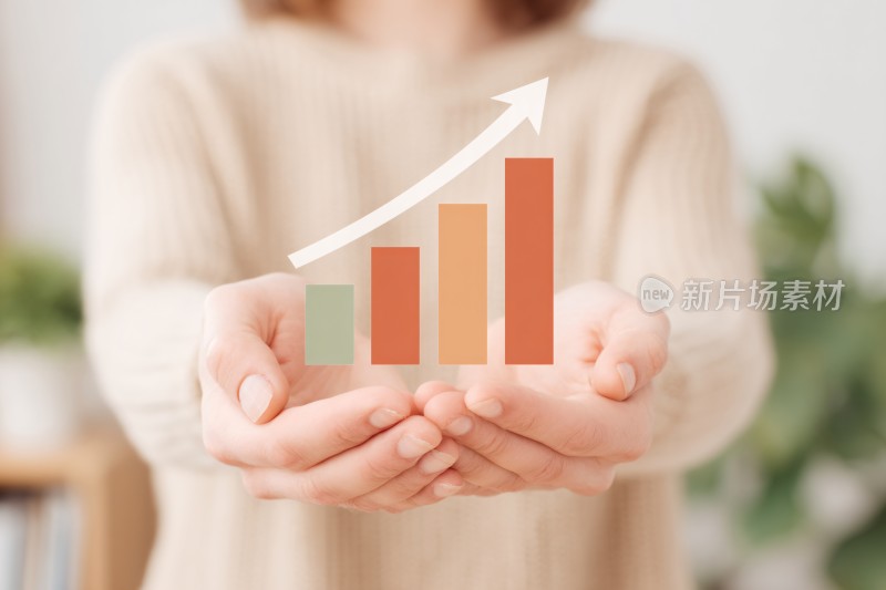 双手托举增长图表画面