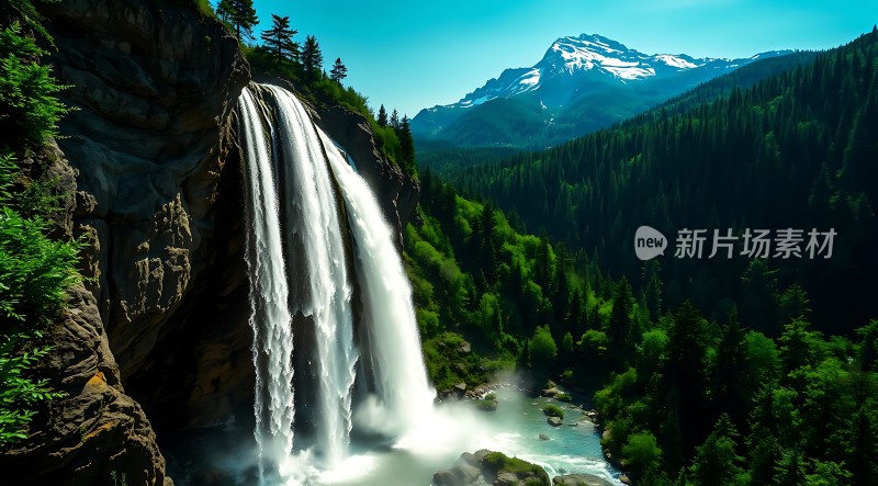 瀑布飞流直下绿树成荫雪山耸立