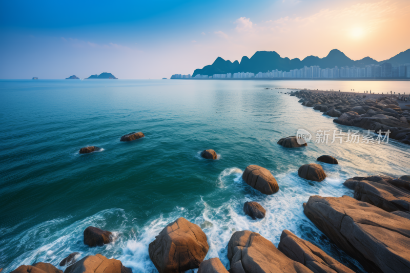 岩石海岸海浪拍打岩石日落高清风景风光图片