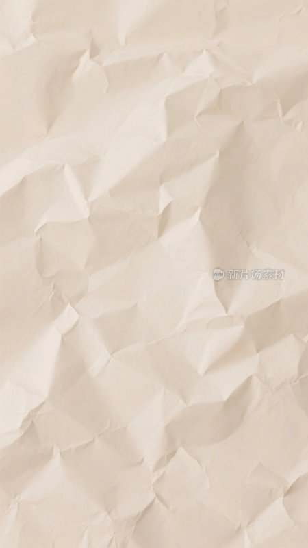 褶皱米色纸张背景图
