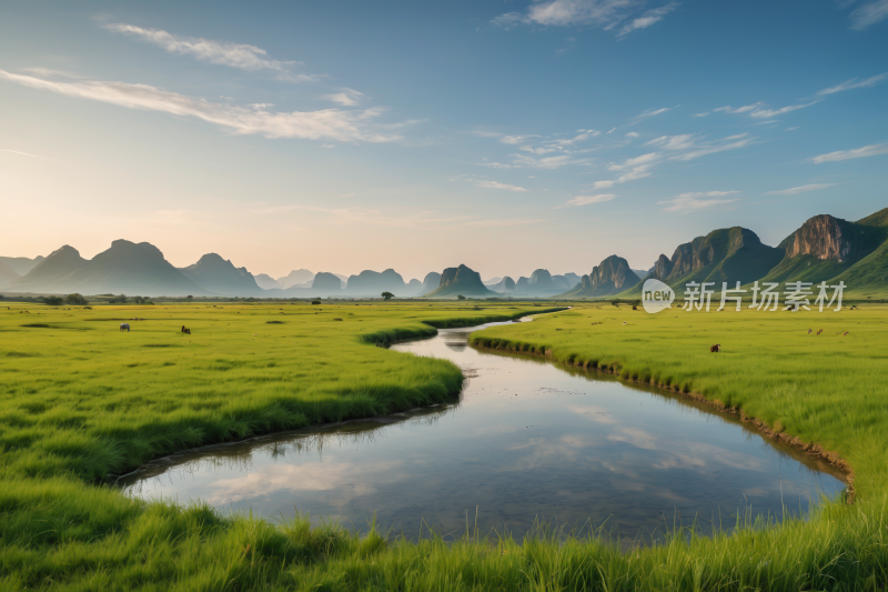 草地上有溪流流过山脉高清风景图片