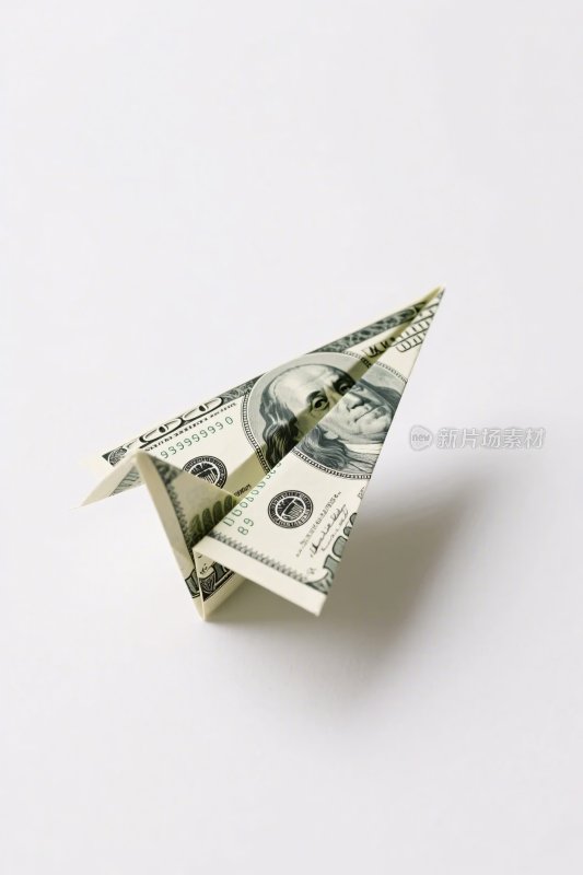 美元折成的纸飞机