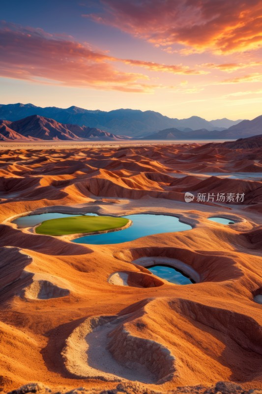 沙漠景观中间一个小池塘高清风景图片