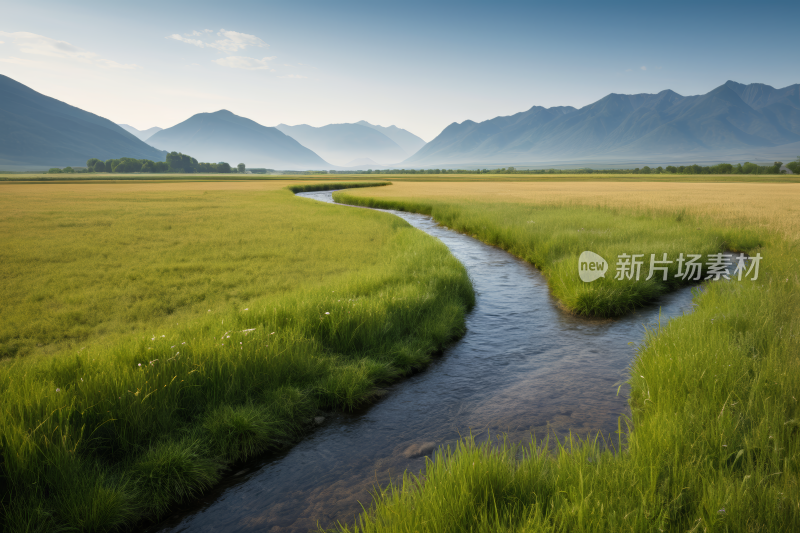 草地上有溪流流过有山脉高清风景图片