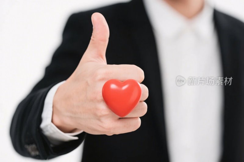 商务人士点赞心手势