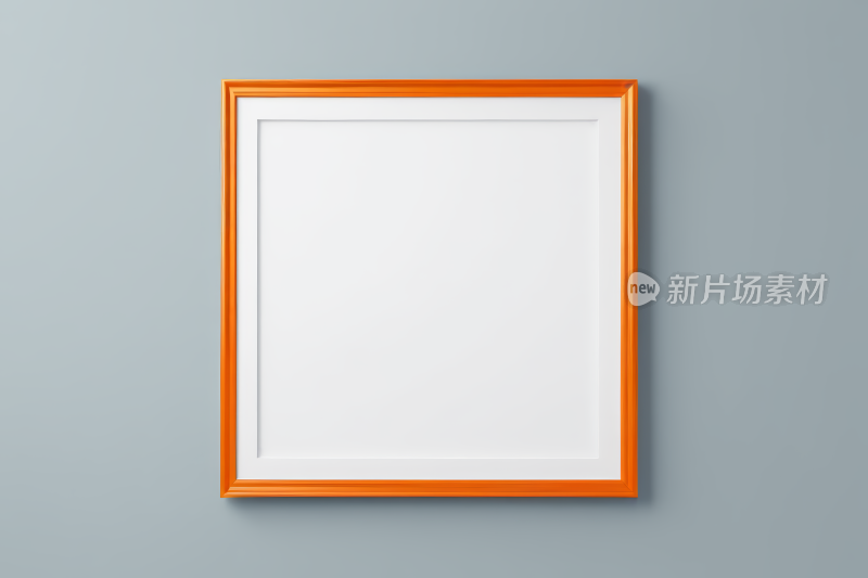 挂在灰色背景墙上的橙色边框图片