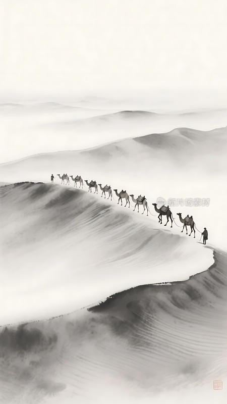 驼队行进在沙丘上