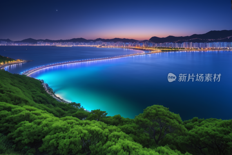 海滩和清澈蓝水城市的夜景高清图片