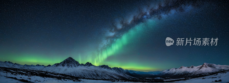 雪山上方有绿光和紫光的星空风景横幅图片