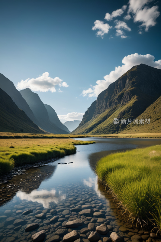 一条河流穿过山谷山脉高清风景图片