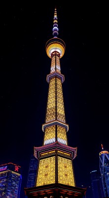 东方明珠夜色璀璨黄蓝灯光闪耀上海天际线