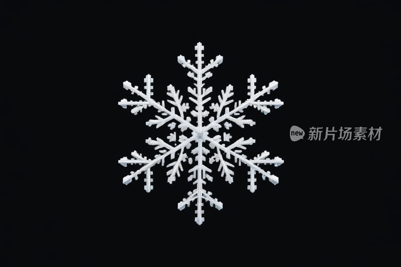 黑色背景上的雪花特写图片