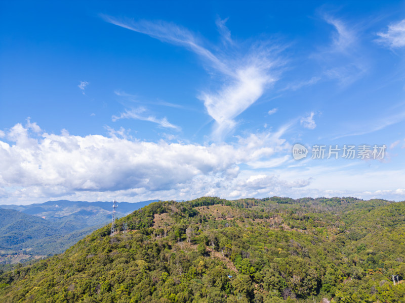 航拍蓝天白云下的景迈山山脉自然风光