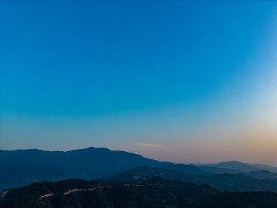 山川丘陵地貌日落晚霞航拍摄影图