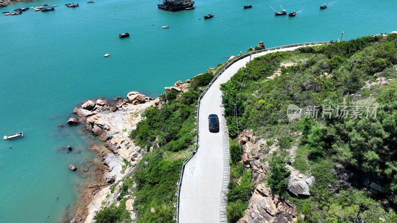 汽车行驶在海边公路航拍风景旅拍旅行自驾游