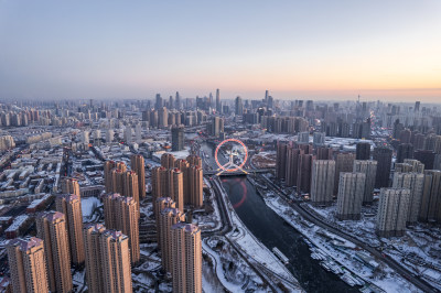天津之眼摩天轮城市建筑雪景日落风光