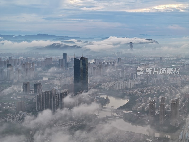 浙江湖州地标云雾缭绕的城市高空鸟瞰全景