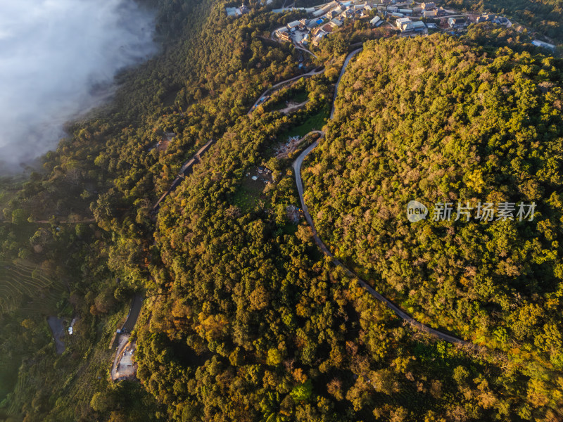 航拍景迈山云海环绕的古寨村庄自然风光