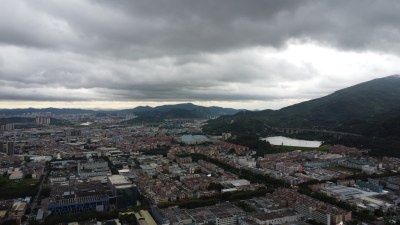 航拍广东省东莞市清溪镇风雨欲来城市风光