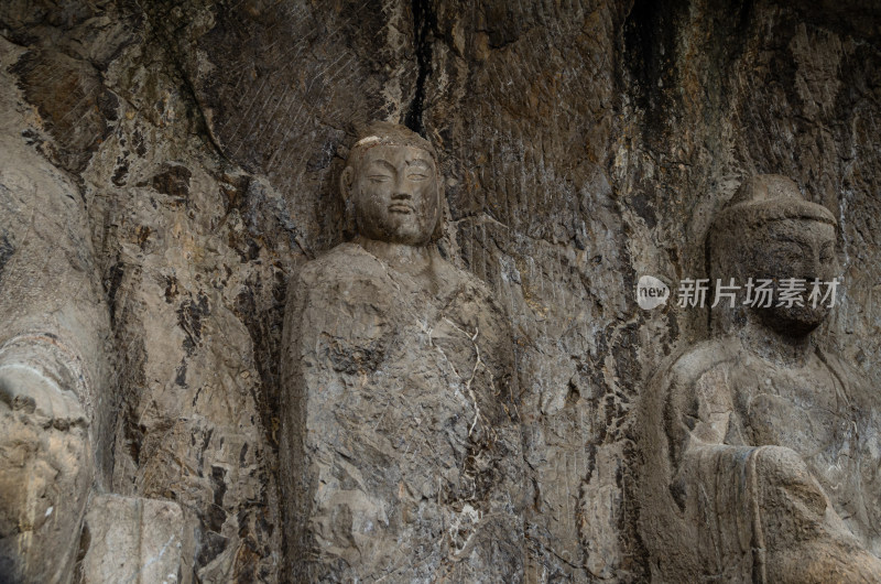 中国河南洛阳龙门石窟摩崖三佛龛佛像