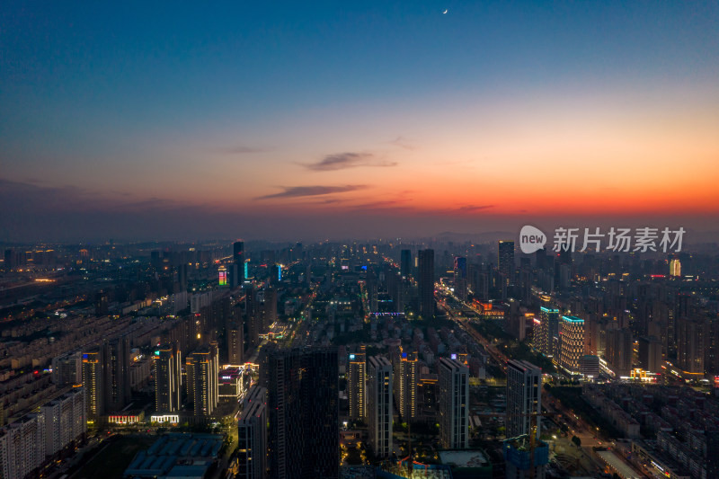 山东日照城市夜幕降临夜景灯光晚霞航拍