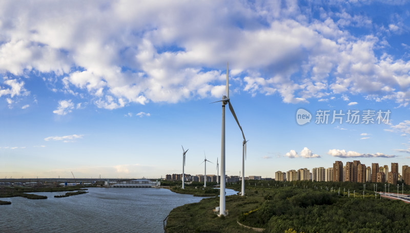 河堤河道旁风力发电机组城市风光自然风景