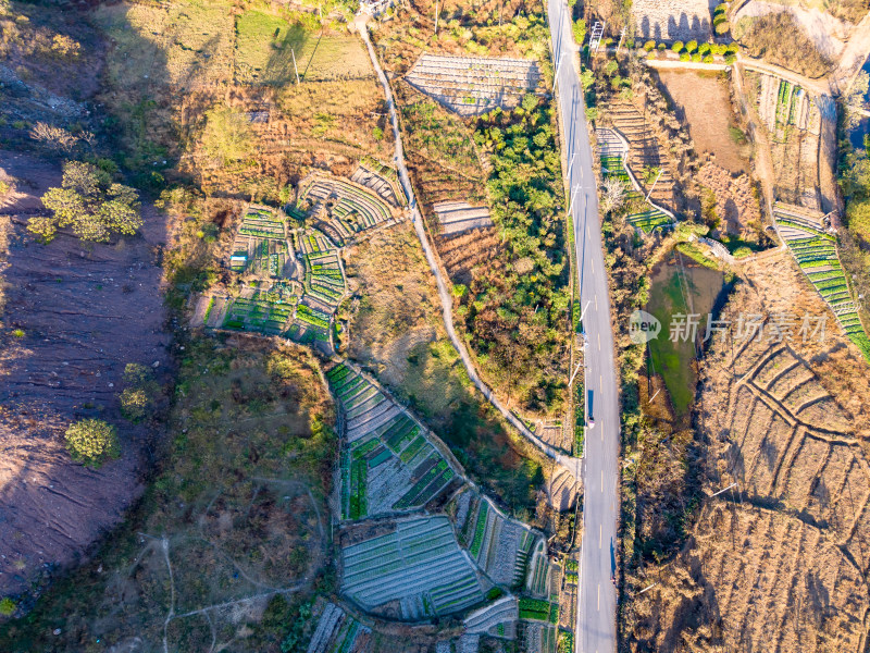 航拍大山乡村公路农田