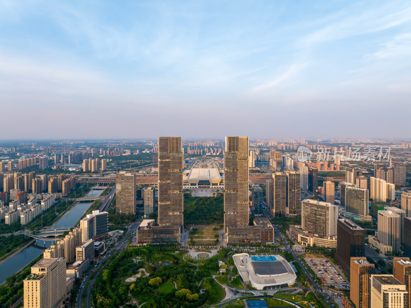 夏季郑州东站绿地双子塔城市天际线航拍风光