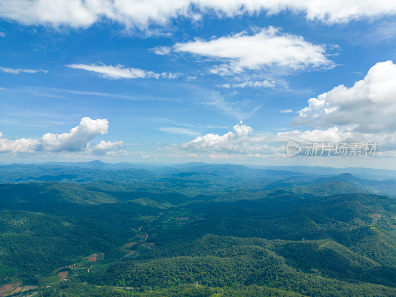 航拍天空高山草甸山脉田园村寨风光