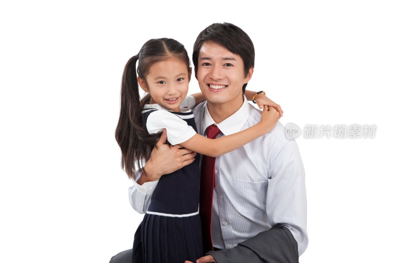 棚拍商务装年轻父亲和穿裙子的小女孩拥抱