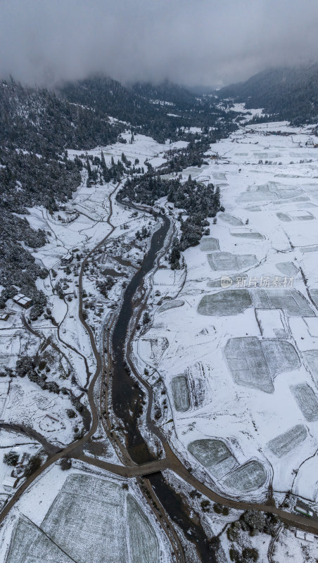 西藏林芝地区鲁朗小镇雪景高空航拍