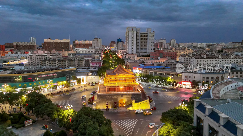 城市夜幕降临甘肃张掖鼓楼夜景航拍图