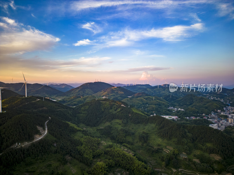 夕阳晚霞山川风车发电航拍摄影图