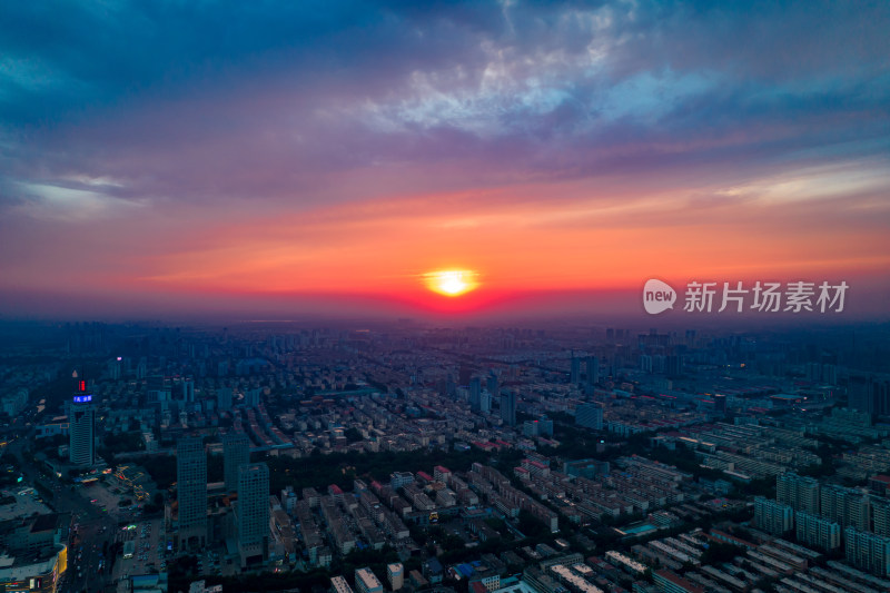 城市日落晚霞夕阳航拍摄影图山东济宁