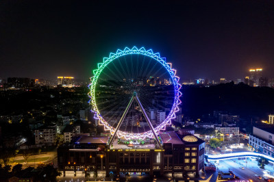 广东中山岐石河摩天轮夜景灯光航拍摄影图