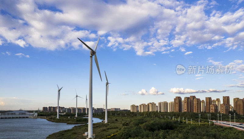 河堤河道旁风力发电机组城市风光自然风景