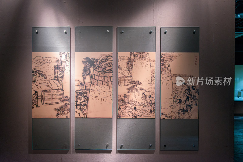 展厅内展示的古代冶炼图画作