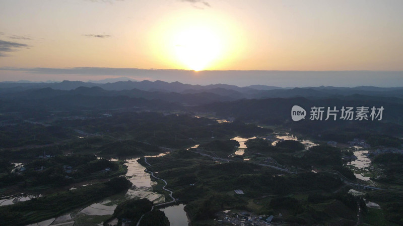 航拍山川农田日落晚霞